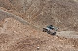 The 4x4 vehicles climbing a hill on the way to Mount Karkom