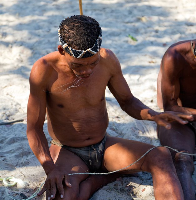 Bushmen Preparing a String for the Bow | Bushmen People - Grootfontein, Namibia (IMG_5622.jpg)