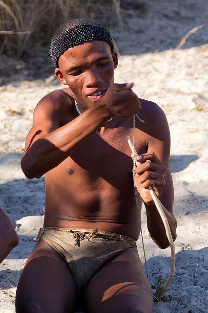 Bushmen Attaching a String to the Bow | Bushmen People - Grootfontein, Namibia (IMG_5640.jpg)