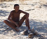 Young Bushman Guarding the Fire