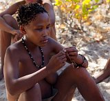 Bushmen Woman Making Traditional Crafts