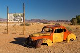 Classic Car Wreck and Sign, Solitaire, Namibia